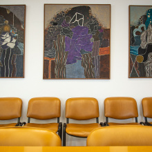 Three of the paintings decorating Conference Room IV