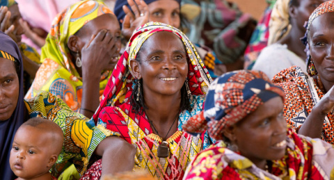 a group of smiling women