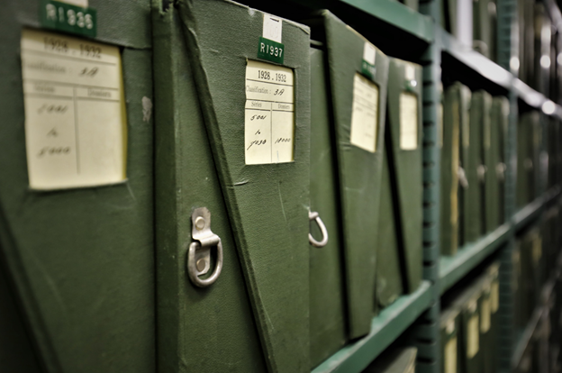 Archive boxes in a shelf