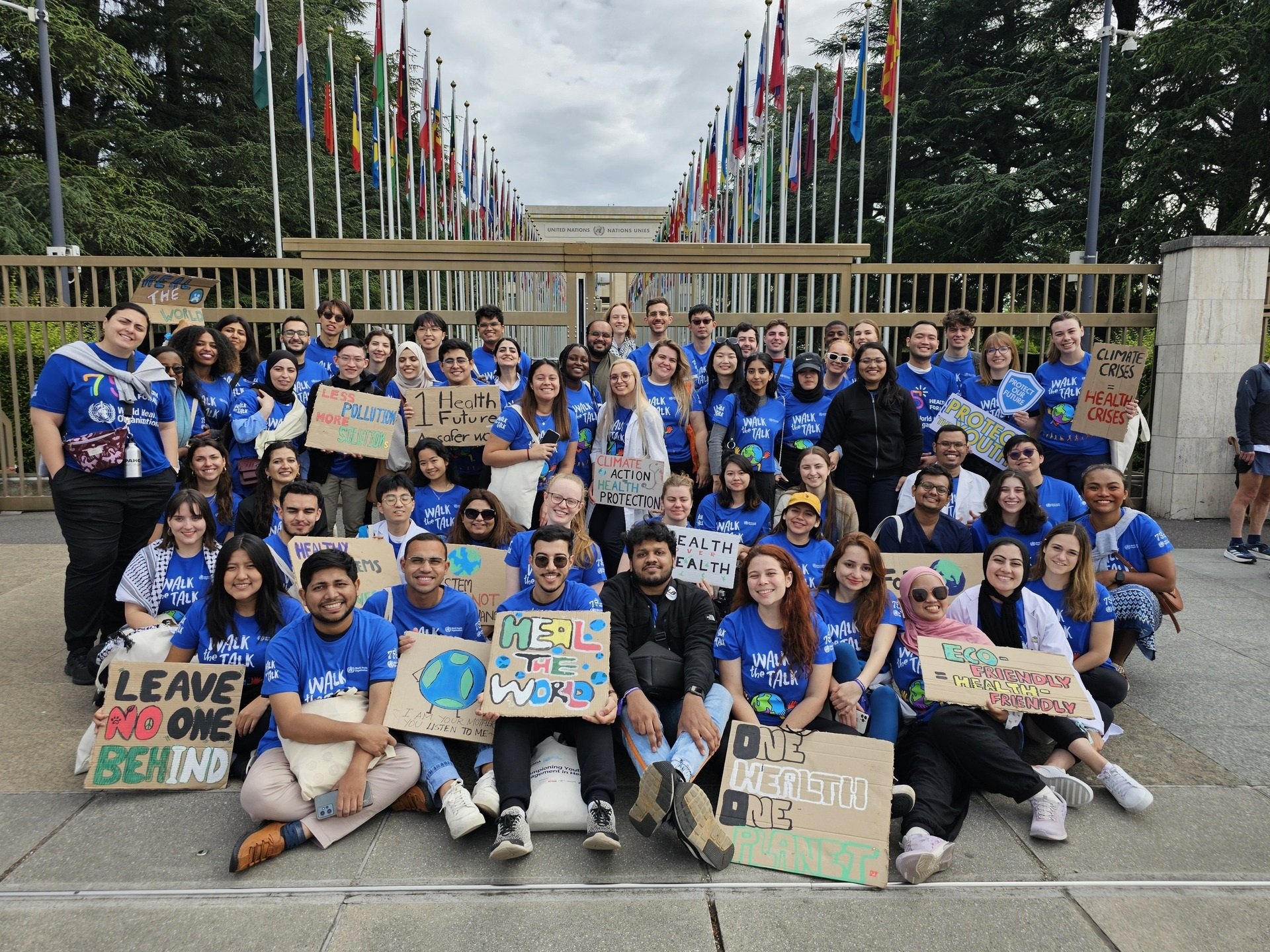 A group of young people gathering in front of UN headquarter for Walk the Talk 2024