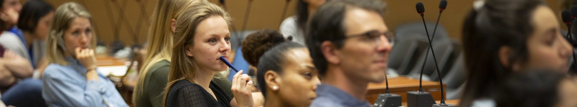 A view of meeting participants, listening