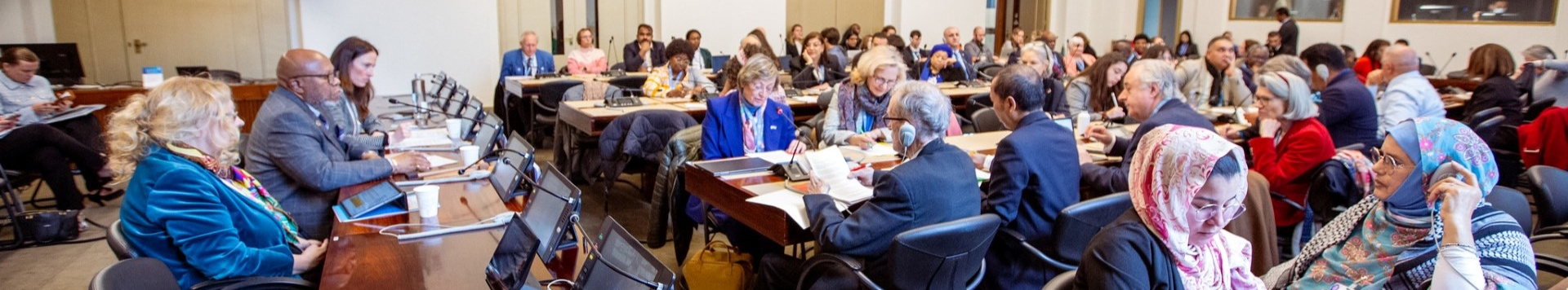 NGO representatives listening to a briefing by the President of the General Assembly, Dennis Francis, who is seen at one side of the room, together with UNOG Director General Tatiana Valovaya