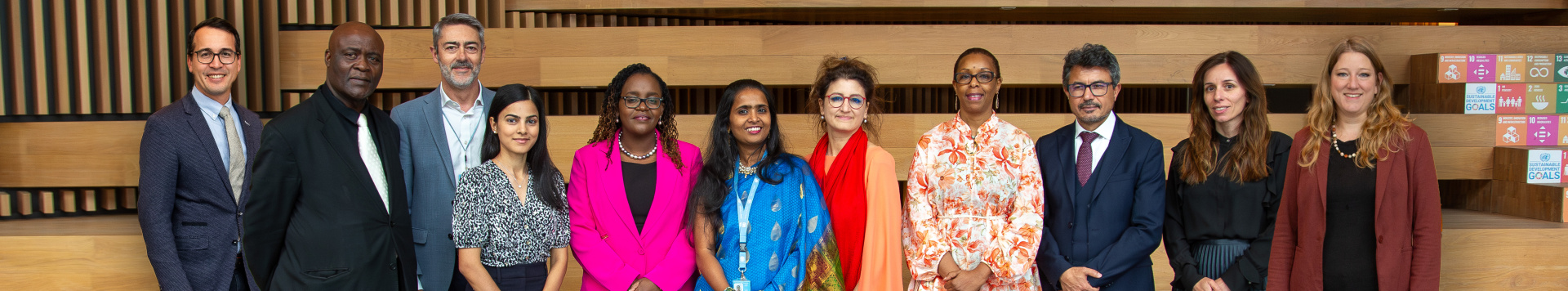 Members of the Working Group against Racism at the Workplace lining up for a group photo